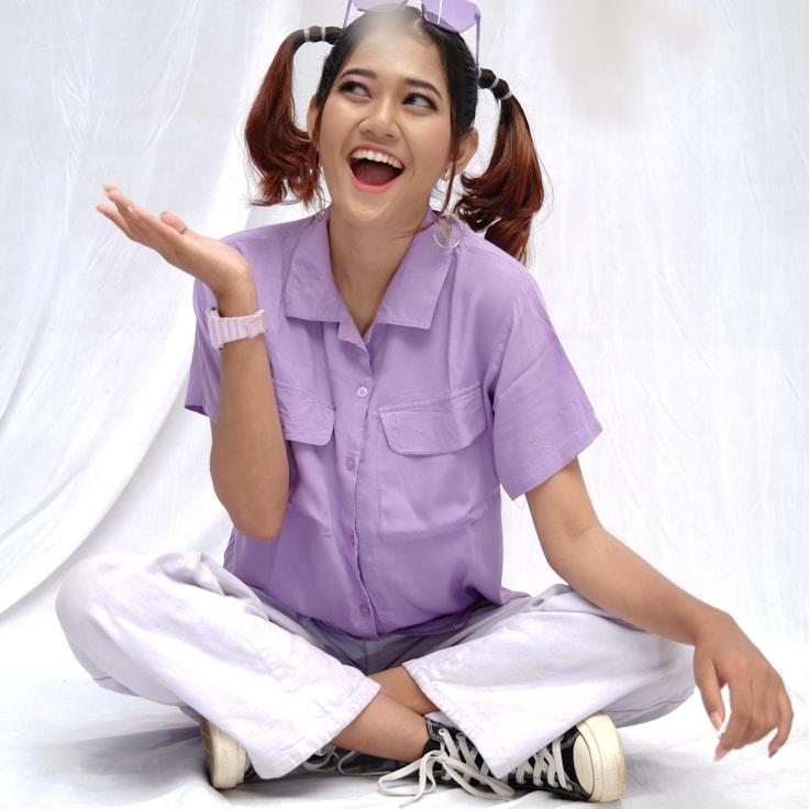 Kaveri Mehta, Lead Design Curator at Maple Light Studio, reviewing corporate floral arrangements